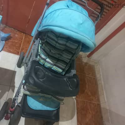 عربه اطفال 3 مستويات لونها لبني