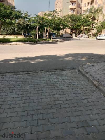 Apartment for sale, 171 sqm, ground floor with a private garden and a private entrance, located within the Opera City compound in Sheikh Zayed.