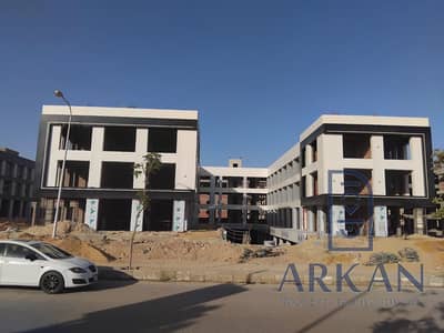 Am-Am- 27 sqm clinic or office for sale, immediate delivery at a mall in Hadayek October! Only 24K monthly, interest-free installments! 