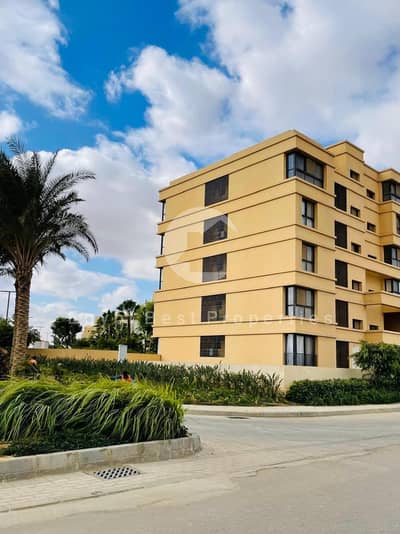 2BR SEMI FINISHED APARTMENT FOR SALE BY ORASCOM IN O WEST WITH LANDESCAPE VIEW UP TO 9 YEARS