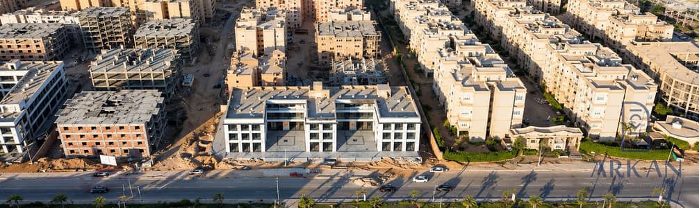 MA The First Floor Shop 45m Facade Facing the Main Street Delivery in 3 Months with a Down Payment of 900 thousand in October Gardens and the remaining installments over 3 years