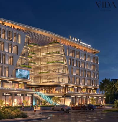 للبيع محل علي المحور المركزي 6 اكتوبر Rawaj Business Complex بالتقسيط علي 12 سنه