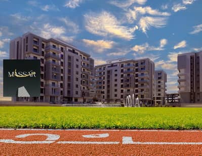 Immediate-delivery apartment with a prime view on a main road in the New Administrative Capital.