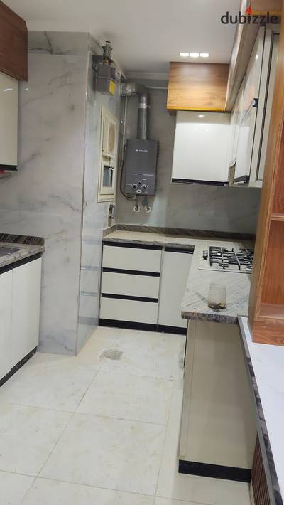 Apartment for rent in Paradise Mohandeseen Compound, Fifth Settlement  With kitchen and stove - Next to the American University AUC