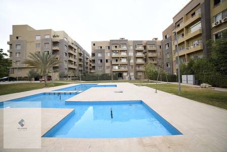 Apartment for rent in Katameya Gardens Compound Nest Cairo in the Fifth Settlement, 165 square meters on the second floor, 3 bedrooms including a master, and a private garage, for 23 thousand pounds monthly