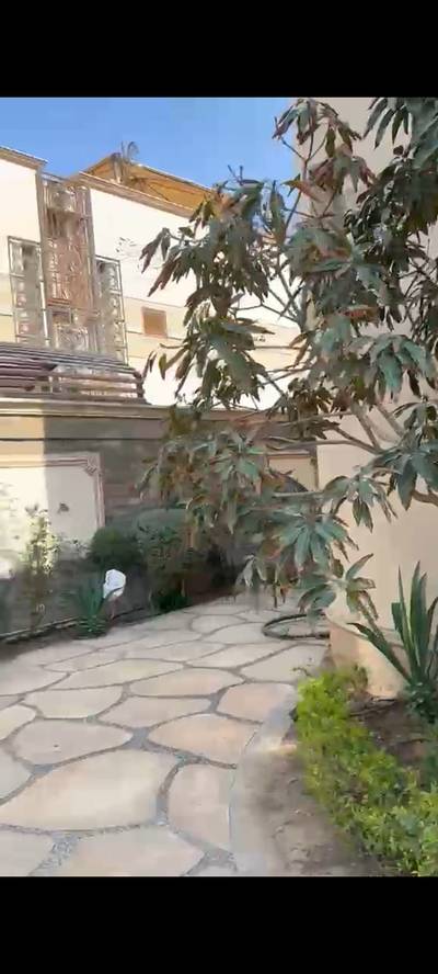 Luxury villa for sale in Royal City Compound, Sheikh Zayed. Features 6 master bedrooms, a private swimming pool, a prime location,and a wonderful view