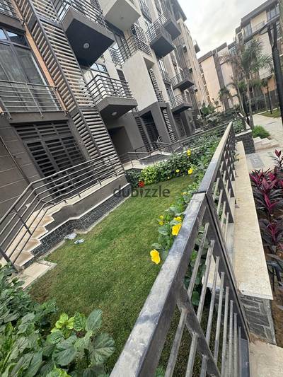 Apartment for sale 119 meters ground floor with garden in the finest stages of Madinaty b8