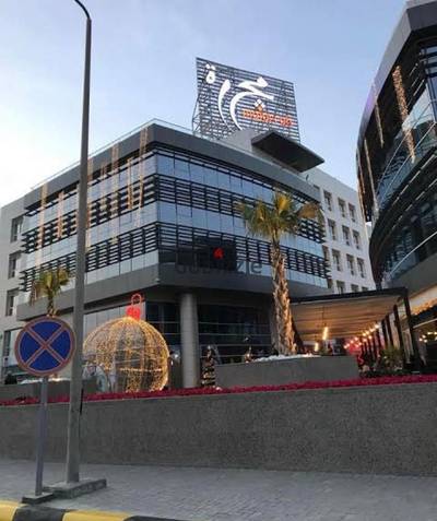 Office for rent 230 meters finished with air conditioning Mall Al-Majarah Sheikh Zayed