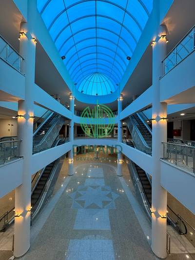 محل دور اول 55 متر مجهز بالتكييفات للايجار في Spot 16 Mall  أكثركثافه سكانيه  بقلب الشيخ زايد الحي ال 16