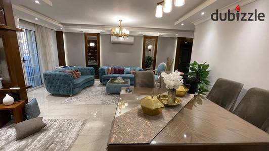 Apartment for sale in the Seventh District, Sheikh Zayed; located on the first floor, includes an elevator, and is fully finished.