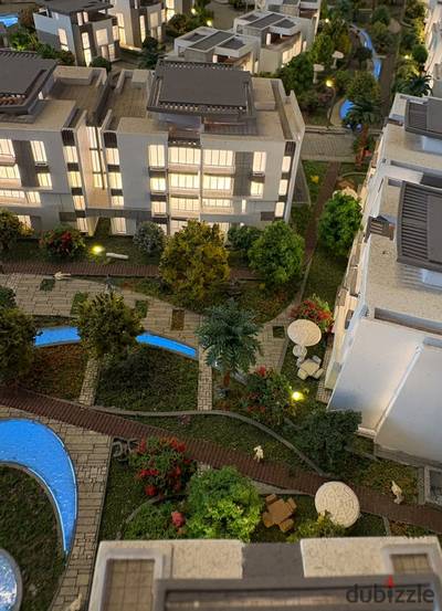 Two-bedroom apartment 100 meters with a garden like a small villa in the heart of New Zayed, installment over 12 years