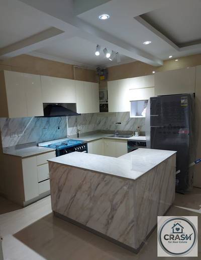 Ground floor apartment with private garden, luxurious finishing, and ready for occupancy in a prime location