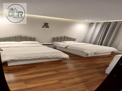 Furnished ground-floor apartment with a garden for rent in Beverly Hills, Sheikh Zayed; available for both long-term and short-term stays.