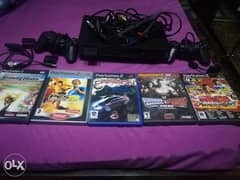 Playstation 2 with 4 games original and 2 controllers original 0