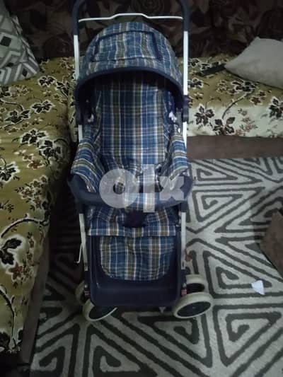 عربية اطفال كحلى تقيله