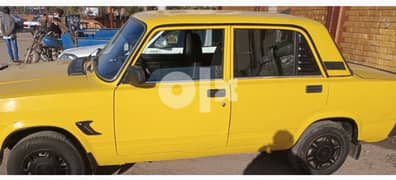 لادا ٢١٠٧ موديل ٢٠١٣ لون اصفر نفس لون التاكسي بالظبط فابريكة برة وجوة 0
