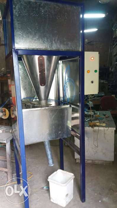 ماكينة تعبئة( بقوليات) من1كجم الى250جم نصف اتوماتيك 01091704260