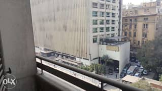 شقه بشارع رمسيس الرئيسي- أمام السنترال 0