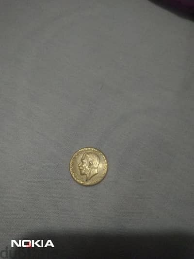 An original and rare British antique  coin of king George V in 1911