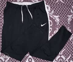 An USA Original trouser / Brand of “NIKE” Made in INDONESIA / AUS IM 0