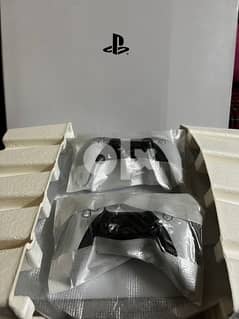 playstation 5 with 2 controllers 0