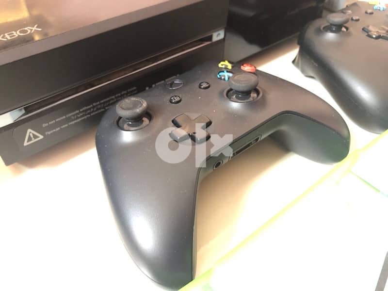 Xbox one upgraded with 2 controllers, 13 CDs 2