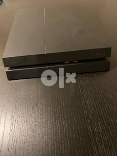 PS4 with 3 games and charging pod. 0