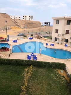 View to the beach and pool   at ‏شايف البحرعلىحمام السباحة 0