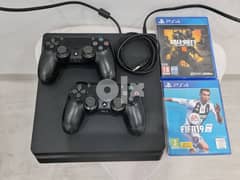 PS4 slim 1TB + 2 original controllers  (like new)