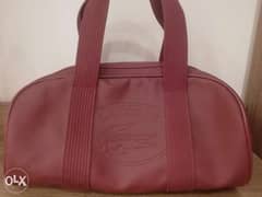 Maroon lacoste duffle bag 9/10 condition steal 0