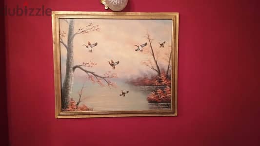 A hand-painted board measuring 60 cm long and 70 cm wide, signed