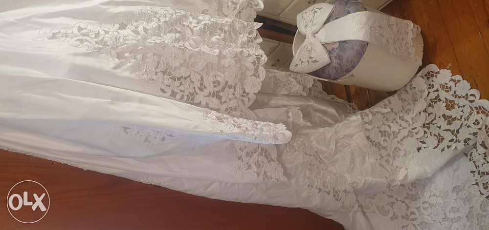 فستان زفاف مستورد كالجديد بالطرحه والجيبون ٢٠٠٠و 1