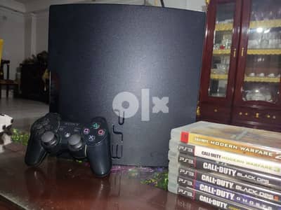 PS3 Slim console 230GB with power cables and controlers + 20 game