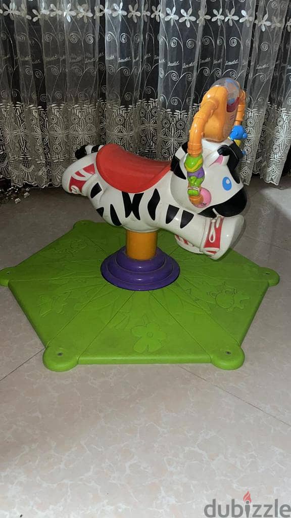 كرسي نطاط ودوّار بموسيقي للأطفال - Bounce and Spin Zebra (Multicolor) 3