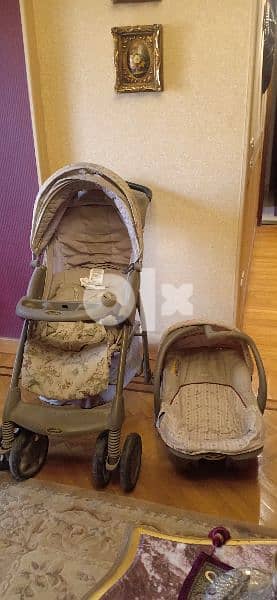 Evenflo stroller with car seat slightly used 1