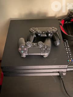 ps4 pro black 1tb 2 controllers 0