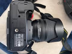 Nikon D7000 with 18-105 lens with original bag 0