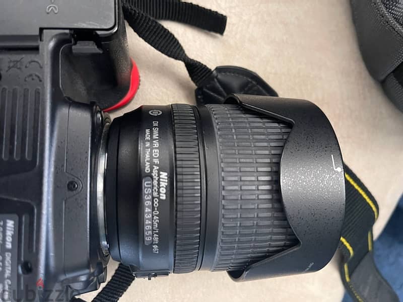 Nikon D7000 with 18-105 lens with original bag 4