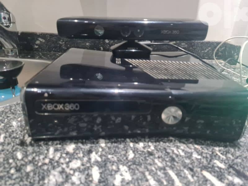 XBOX 360 with Kinect sensors and including some last decade games 2
