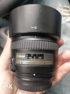 Nikon lens 50 F1.4 like new used only 4 times 0