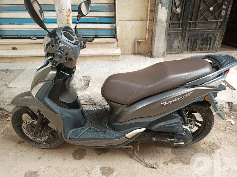 اسكوتر st200 4