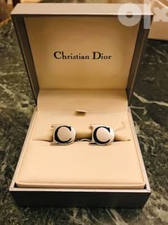 ازرار اكمام من كريستيان ديو فضىChristin Dior 0