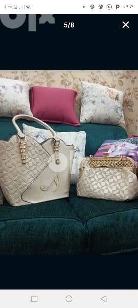 شنطة وبرتوفيه تحفة جدا اوكسيده للمناسبات