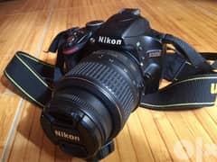 Nikon D3200 DSLR camera + tripod + UV filter