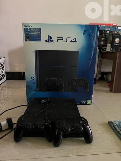 PlayStation 4 1TB with 2 controllers
