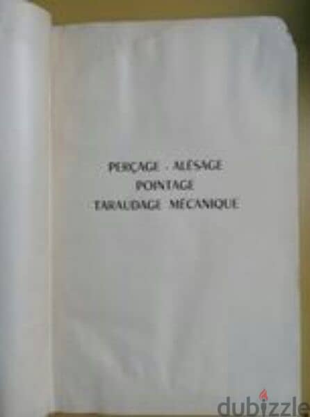 كتاب فرنساوي قديم سنة 1960 عن الثقب السعر 50 جنية 0