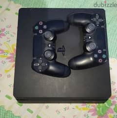 PS4 Console in an excellent condition & 2 Controllers & Minecraft CD