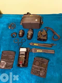 Nikon D5100 with 2 Lenses (55-300mm VR - 18-55mm VR)+ many accessories 0