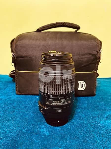 Nikon D5100 with 2 Lenses (55-300mm VR - 18-55mm VR)+ many accessories 10