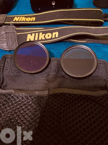 Nikon D5100 with 2 Lenses (55-300mm VR - 18-55mm VR)+ many accessories 15